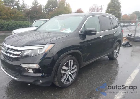 2016 Honda Pilot Touring z USA, uszkodzony, nr VIN 5FNYF5H90GB001291